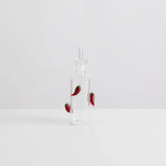 Maison Balzac The Chilli Bottle with handcrafted glass chillies, perfect for dispensing chili oil in style.